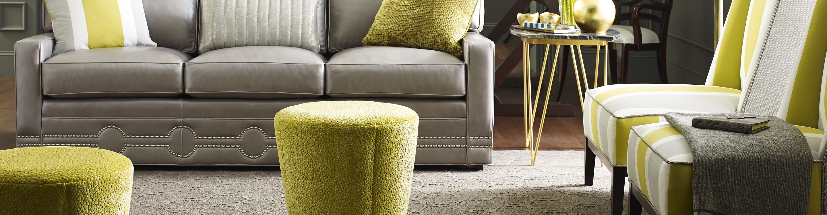 neutral textured light brown area rug in living area with grey and lime green furniture